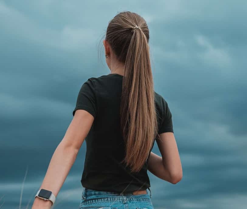 woman walking in field